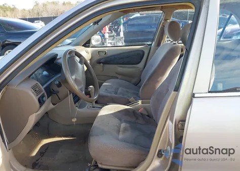 2001 Chevrolet Geo Prizm Lsi from USA, damaged, VIN 1Y1SK52881Z415708